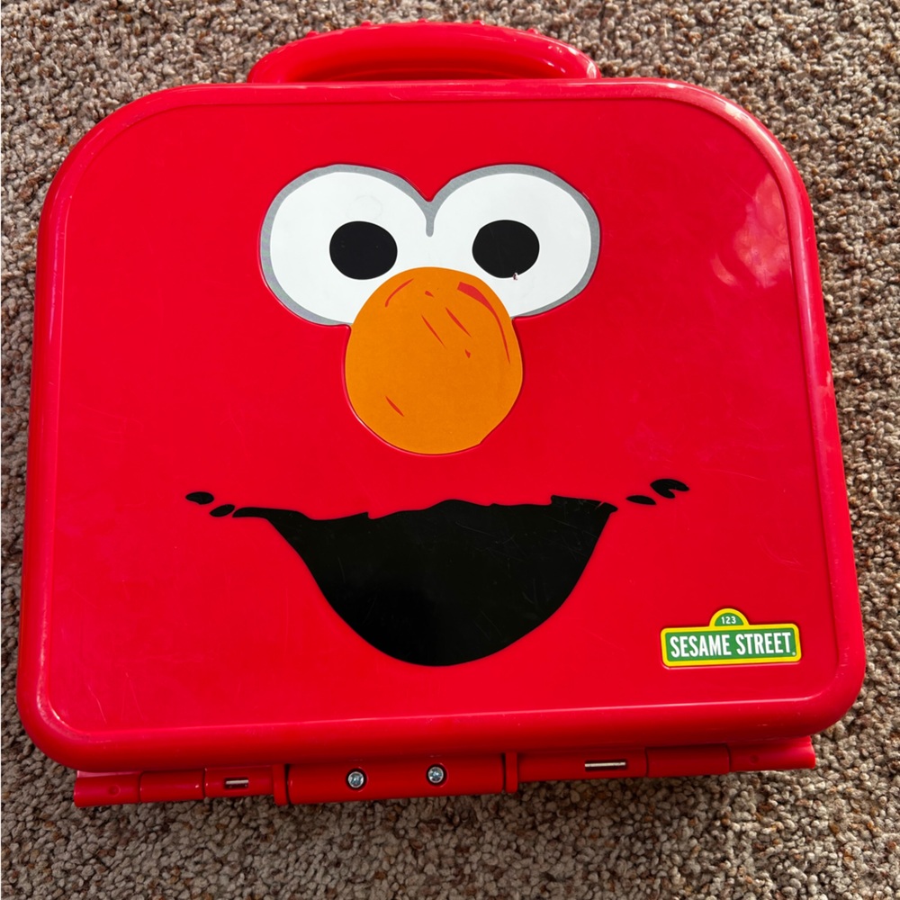 Sesame Street Bright Red Elmo Alphabet Suitcase